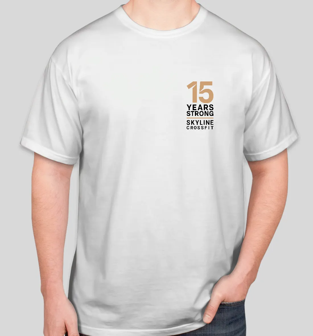A "15 years strong" Skyline CrossFit left-chest design on a white tee.